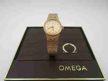 Omega mujer. Chapado oro y acero. Cuerda manual. Brazalete. Estuche. 1970
