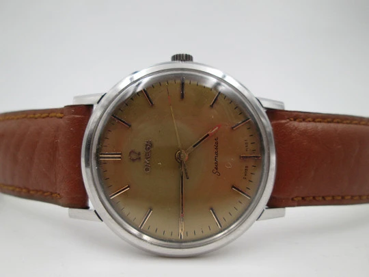 Omega Seamaster. Acero inoxidable. Cuerda manual. Correa piel marrón. 1960. Suiza