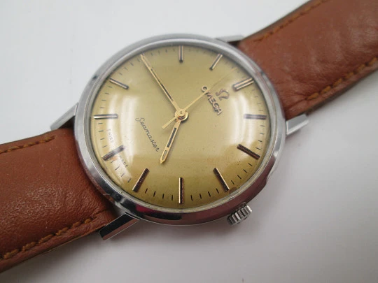 Omega Seamaster. Acero inoxidable. Cuerda manual. Correa piel marrón. 1960. Suiza