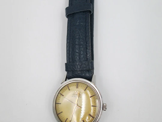 Omega Seamaster. Automatic. 1960's. Stainless steel. Golden dial. Strap