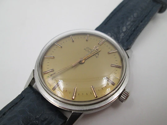 Omega Seamaster. Automatic. 1960's. Stainless steel. Golden dial. Strap