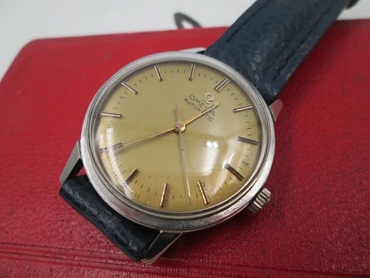 Omega Seamaster. Automatic. 1960's. Stainless steel. Golden dial. Strap