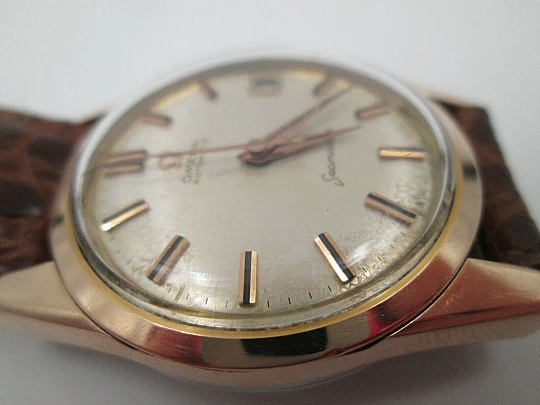 Omega Seamaster. Chapado / acero. Automático. 1960. Calendario. Correa