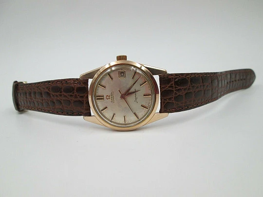 Omega Seamaster. Gold plated & stainless steel. 1960's. Automatic. Calendar. Swiss