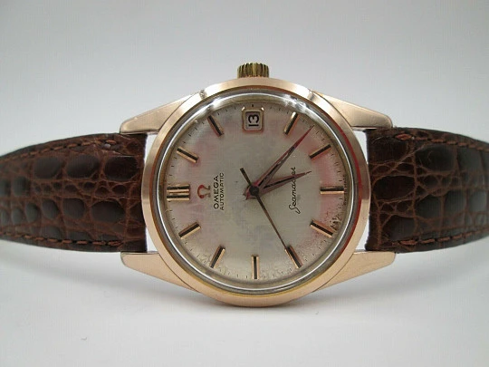 Omega Seamaster. Gold plated & stainless steel. 1960's. Automatic. Calendar. Swiss