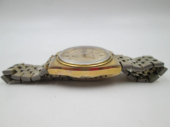 Omega Seamaster. Steel and gold plated. Bracelet. Quartz. Calendar. Swiss. 1970's