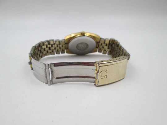 Omega Seamaster. Steel and gold plated. Bracelet. Quartz. Calendar. Swiss. 1970's