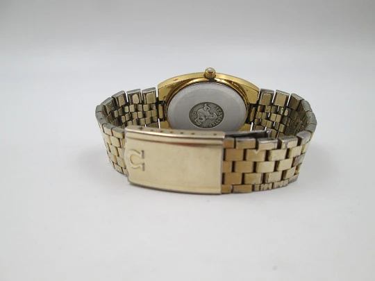 Omega Seamaster. Steel and gold plated. Bracelet. Quartz. Calendar. Swiss. 1970's