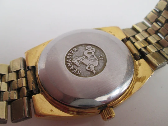 Omega Seamaster. Steel and gold plated. Bracelet. Quartz. Calendar. Swiss. 1970's