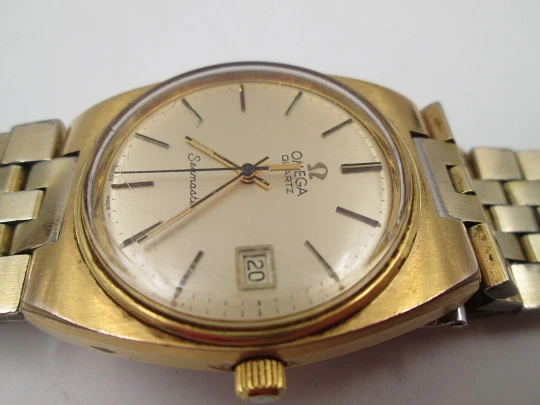 Omega Seamaster. Steel and gold plated. Bracelet. Quartz. Calendar. Swiss. 1970's