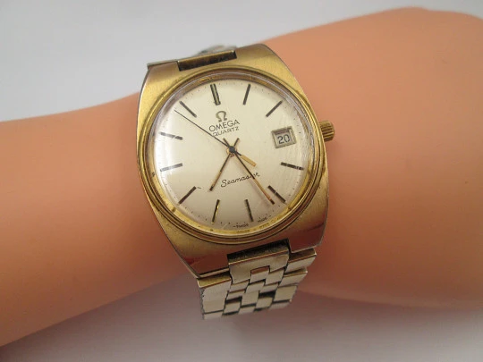 Omega Seamaster. Steel and gold plated. Bracelet. Quartz. Calendar. Swiss. 1970's
