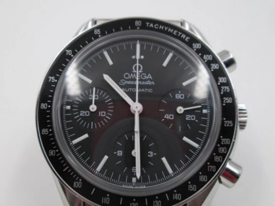 Omega Speedmaster automatic chronograph. Black dial. Bracelet. Steel