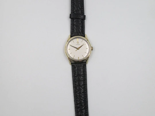 Omega. 14 karat gold-filled. Manual wind. Leather strap. 1950's. Swiss