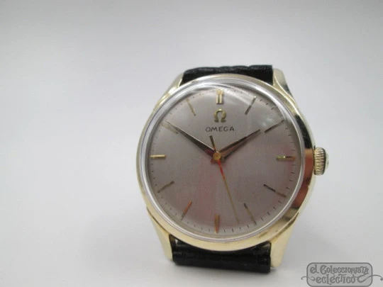 Omega. 14 karat gold-filled. Manual wind. Leather strap. 1950's. Swiss