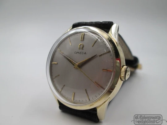 Omega. 14 karat gold-filled. Manual wind. Leather strap. 1950's. Swiss