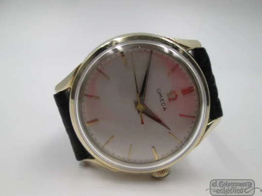 Omega. 14 karat gold-filled. Manual wind. Leather strap. 1950's. Swiss