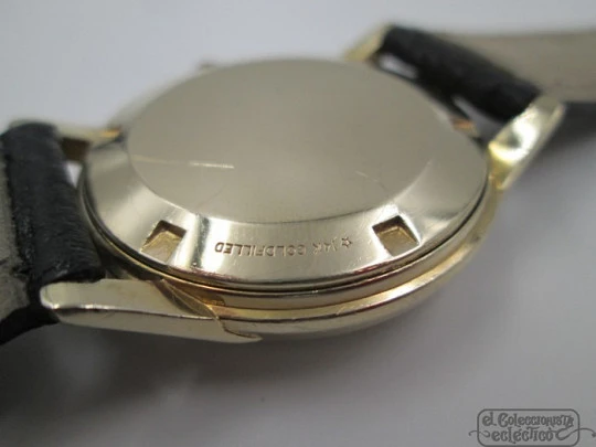 Omega. 14 karat gold-filled. Manual wind. Leather strap. 1950's. Swiss