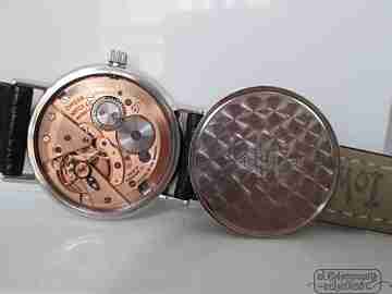Omega. Acero. Genève. 1960. Cuerda manual. Dial gris. Suiza