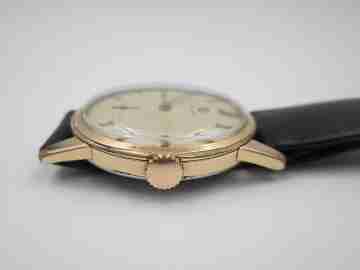 Omega. Chapado oro / acero. Cuerda manual. Segundero. Correa. 1960