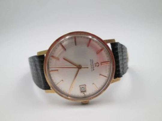 Omega. Gold plated & stainless steel. 1960's. Date. Automatic. Strap