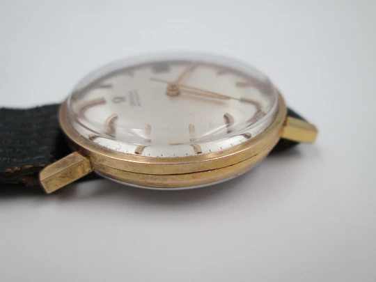 Omega. Gold plated & stainless steel. 1960's. Date. Automatic. Strap