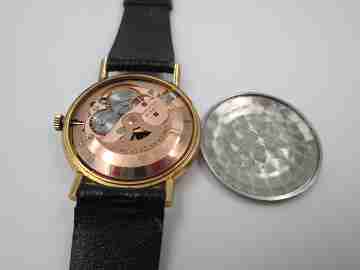 Omega. Gold plated & stainless steel. 1960's. Date. Automatic. Strap