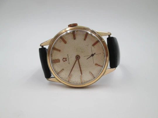 Omega. Gold plated & stainless steel. 1960's. Manual wind. Strap. Sub second