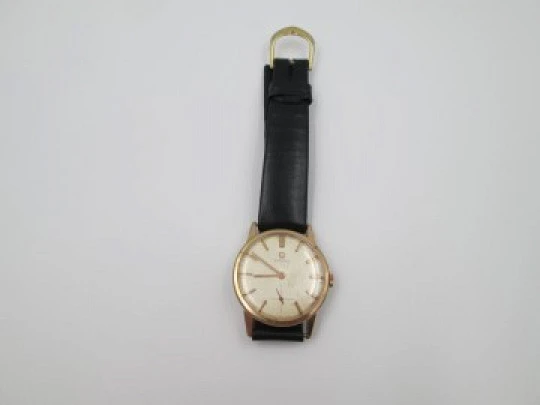 Omega. Gold plated & stainless steel. 1960's. Manual wind. Strap. Sub second