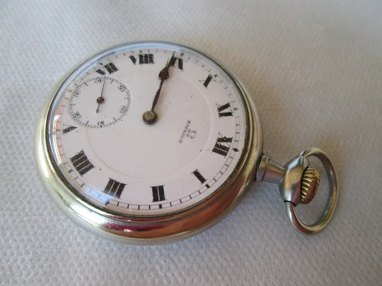 Omega. Metal blanco. Segundero. Cuerda remontoir. Lepine. 1920