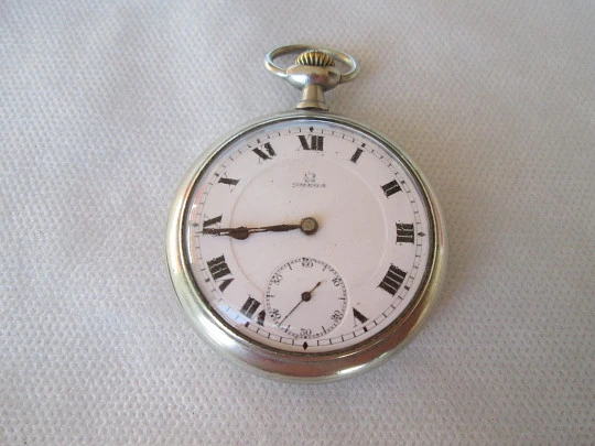 Omega. Metal blanco. Segundero. Cuerda remontoir. Lepine. 1920