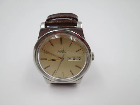 Omega. Stainless steel. Automatic. 1970's. Golden dial. Date & day