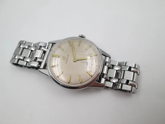 Omega. Stainless steel. Manual wind. Small seconds hand. Bracelet. 1960's. Swiss
