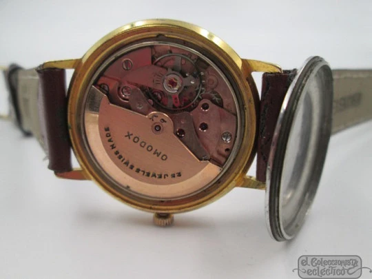 Omodox. Gold plated and steel. Automatic. Date. 1960's. Swiss Omodox. Gold plated and steel. Automatic. Date. 1960's. Swiss