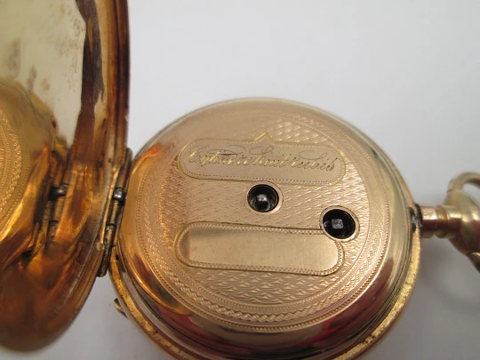 Open-face pocket watch. 14 karat yellow gold. Key-wind movement. Floral motifs. 1890's