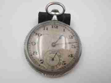 Open face pocket watch. 800 sterling silver. Ornate back. Small second hand