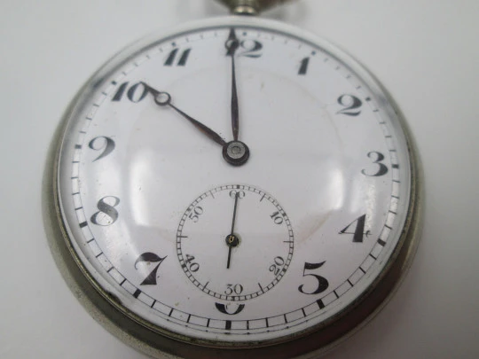 Open-face pocket watch. Silver plated metal. Porcelain dial. Stem-wind. Europe. 1920's