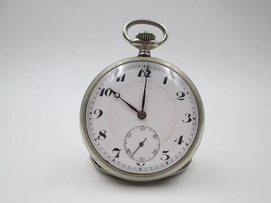 Open-face pocket watch. Silver plated metal. Porcelain dial. Stem-wind. Europe. 1920's