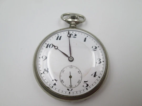 Open-face pocket watch. Silver plated metal. Porcelain dial. Stem-wind. Europe. 1920's