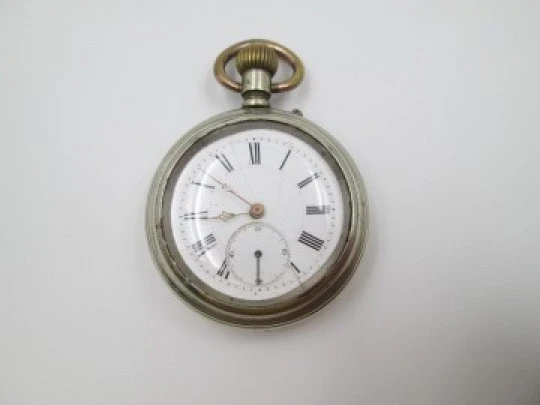 Open face pocket watch. Silver plated metal. Stem-wind. Circa 1910's. Swiss