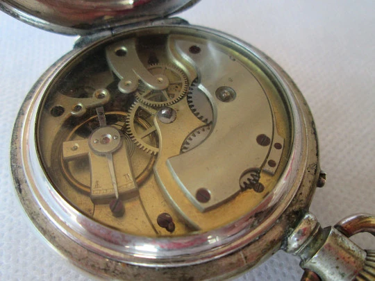 Open face pocket watch. Silver plated metal. Stem-wind. Circa 1910's. Swiss