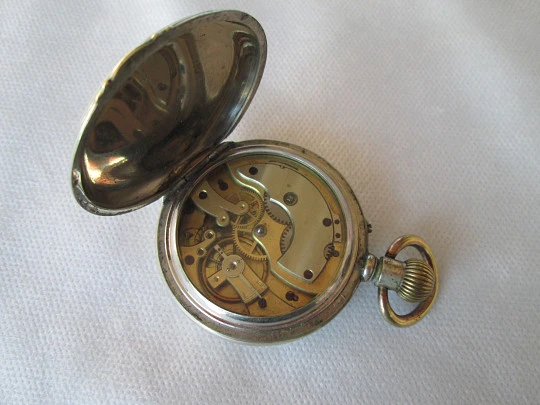 Open face pocket watch. Silver plated metal. Stem-wind. Circa 1910's. Swiss