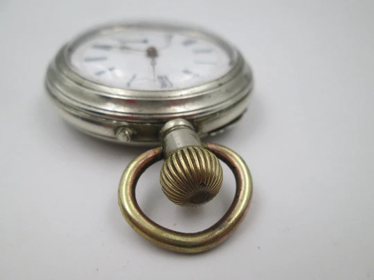 Open face pocket watch. Silver plated. Porcelain dial. Small second hand. 1900's
