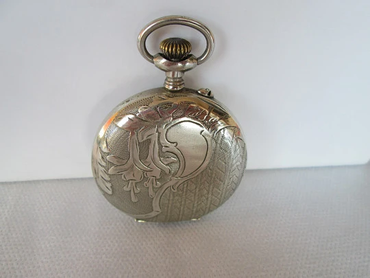 Open face pocket watch. Silver plated. Stem-wind. 1910. France. Ornate back