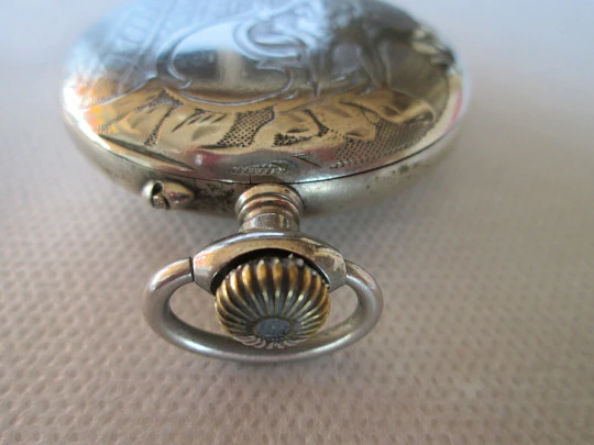 Open face pocket watch. Silver plated. Stem-wind. 1910. France. Ornate back