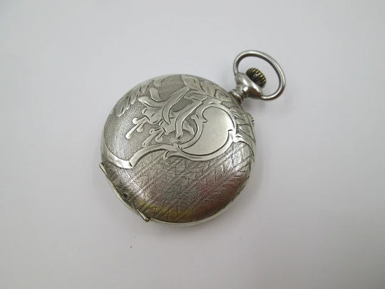 Open face pocket watch. Silver plated. Stem-wind. 1910. France. Ornate back