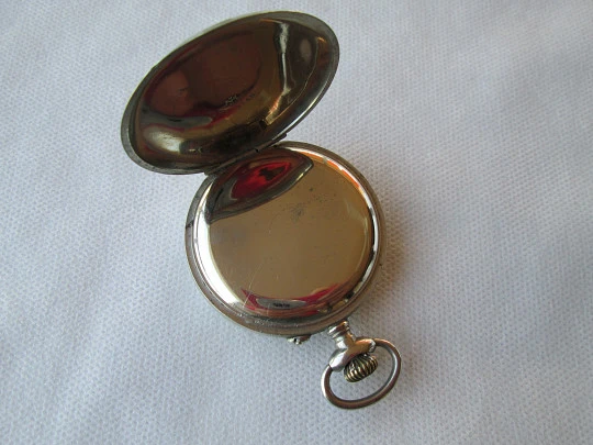 Open face pocket watch. Silver plated. Stem-wind. 1910. France. Ornate back