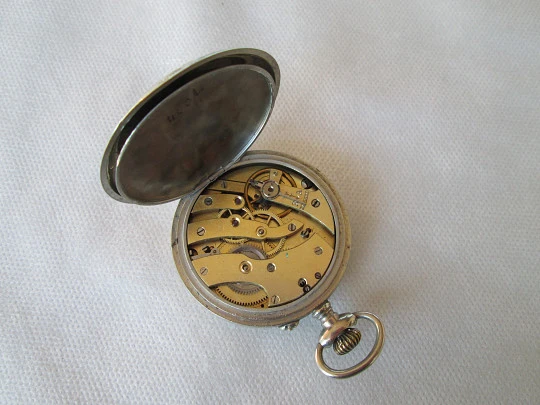 Open face pocket watch. Silver plated. Stem-wind. 1910. France. Ornate back