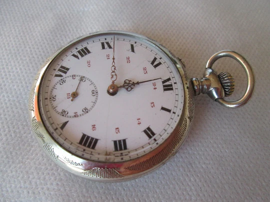 Open face pocket watch. Silver plated. Stem-wind. 1910. France. Ornate back