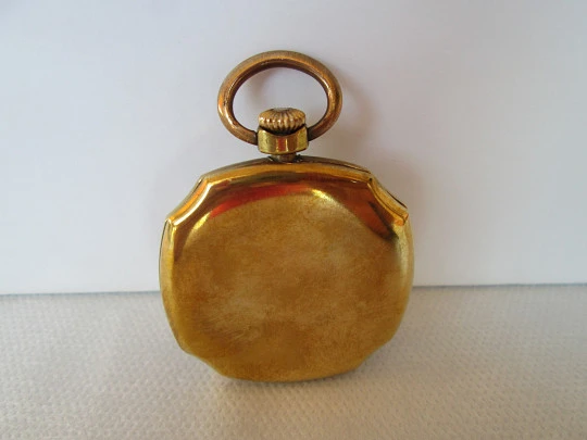 Open-face swiss pocket watch. Octogonal case. Gold plated metal