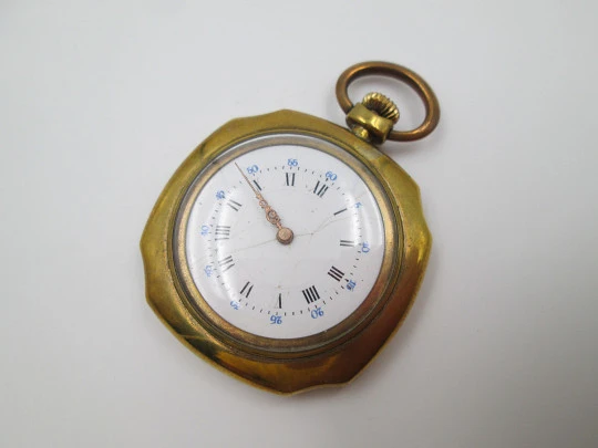 Open-face swiss pocket watch. Octogonal case. Gold plated metal